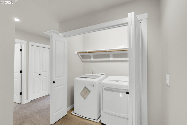385 SW Mitchum Ter, Beaverton, OR 97006 - laundry room featuring washer and clothes dryer and light colored carpet