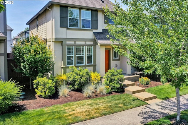 385 SW Mitchum Ter, Beaverton, OR 97006 - view of front facade featuring stucco siding and a shingled roof