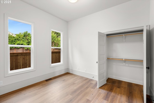 2089 5th Ave, West Linn, OR 97068 - unfurnished bedroom featuring wood finished floors and a closet