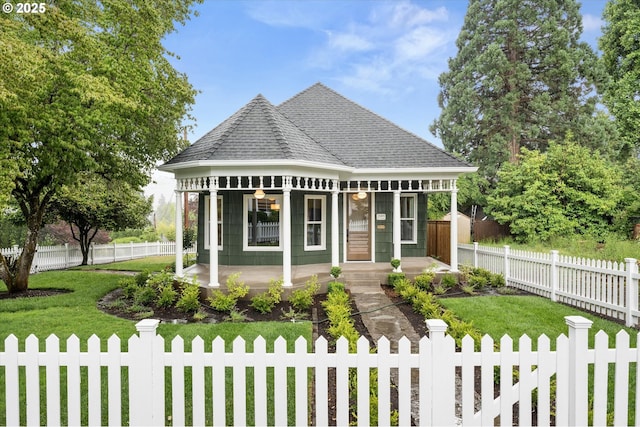 2089 5th Ave, West Linn, OR 97068 - victorian home with a porch, a fenced front yard, and roof with shingles