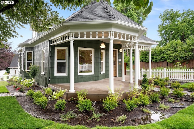 2089 5th Ave, West Linn, OR 97068 - view of side of home featuring covered porch and roof with shingles