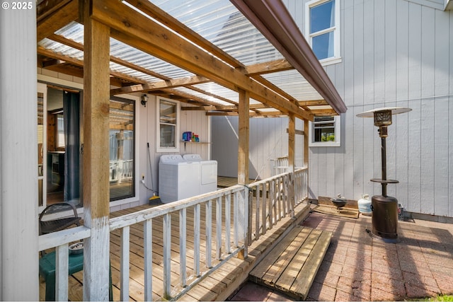 wooden deck with independent washer and dryer