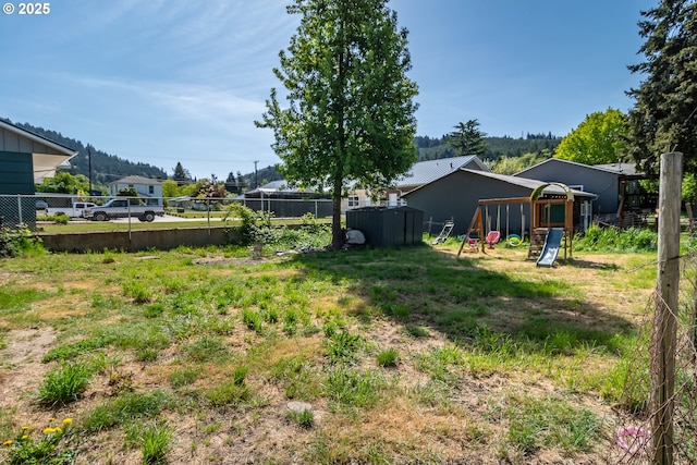 view of yard with fence