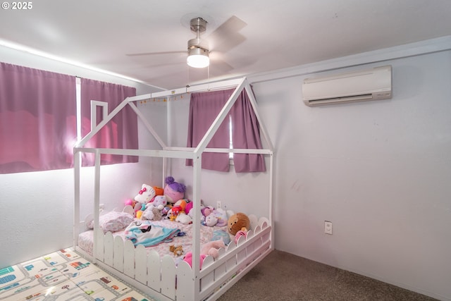 bedroom with carpet flooring, a ceiling fan, and a wall mounted AC