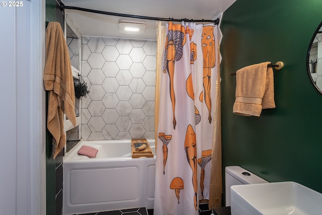 bathroom with toilet and shower / tub combo