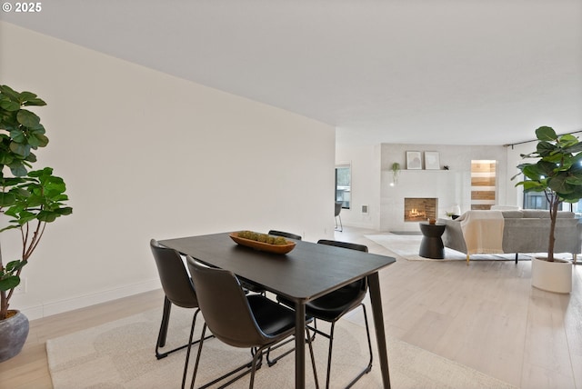 dining space featuring light hardwood / wood-style floors