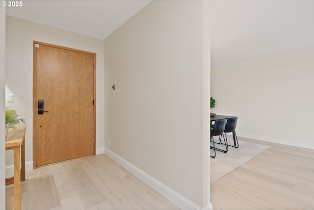 foyer with light wood-type flooring