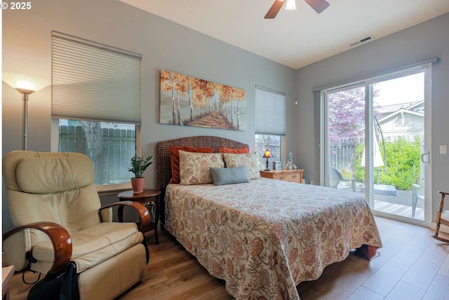 6641 NE Rosebay Dr, Hillsboro, OR 97124 - bedroom with access to outside, wood finished floors, and ceiling fan