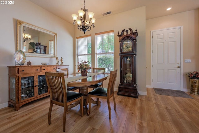 6641 NE Rosebay Dr, Hillsboro, OR 97124 - dining area featuring a chandelier, wood finished floors, baseboards, and recessed lighting