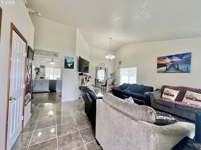 living room with high vaulted ceiling, an inviting chandelier, sink, and a textured ceiling