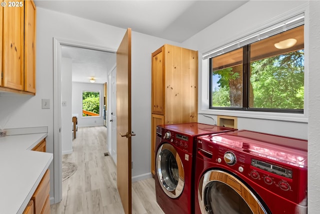 93933 Marcola Rd, Marcola, OR 97454 - laundry area featuring cabinet space and separate washer and dryer