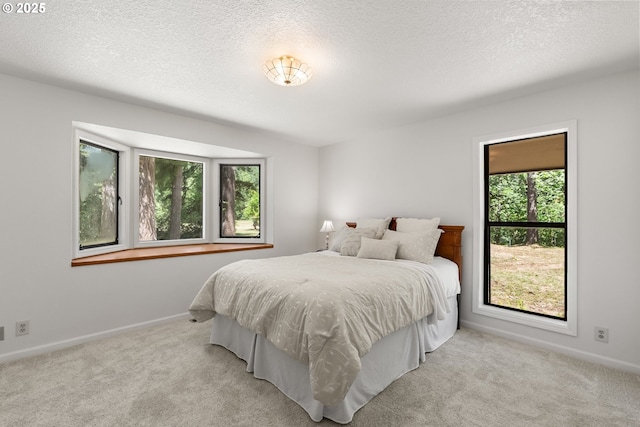 93933 Marcola Rd, Marcola, OR 97454 - bedroom featuring light colored carpet and a textured ceiling