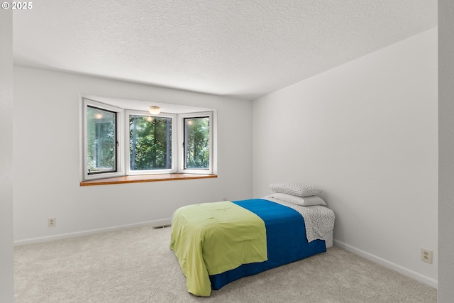 93933 Marcola Rd, Marcola, OR 97454 - bedroom with carpet flooring and a textured ceiling