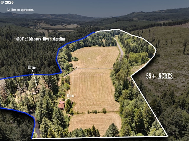 93933 Marcola Rd, Marcola, OR 97454 - overview of rural landscape featuring a mountain backdrop and property parcel outlined