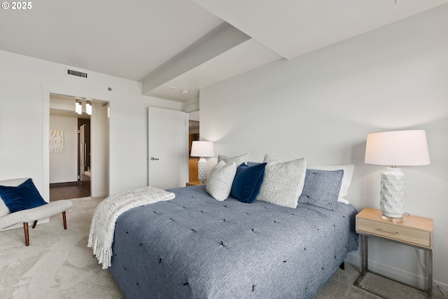 bedroom with carpet and visible vents