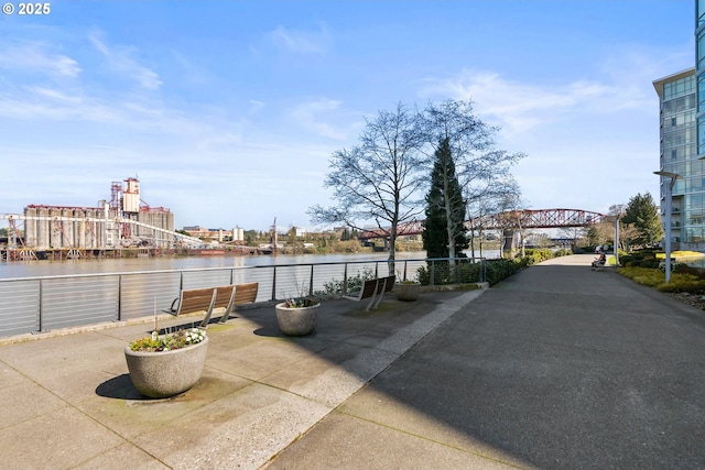 view of patio with a water view