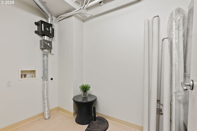 clothes washing area with baseboards, hookup for a washing machine, tile patterned floors, and hookup for an electric dryer