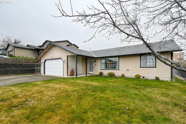 view of front of property with a garage and a front lawn