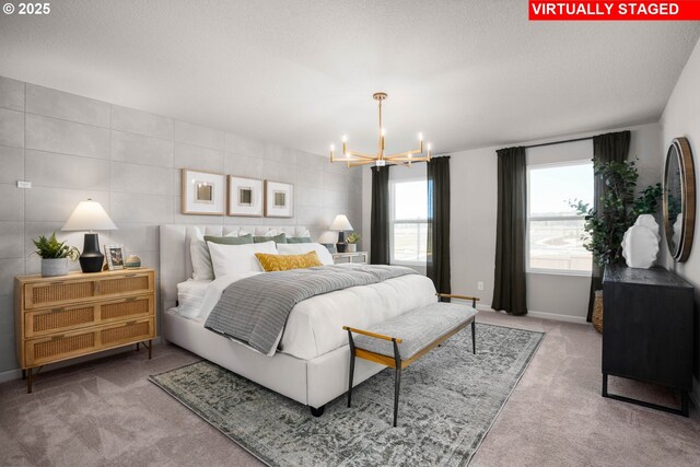 31766 NW Turel Dr, North Plains, OR 97133 - carpeted bedroom with a chandelier, a textured ceiling, and baseboards
