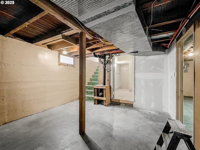 basement featuring stairway