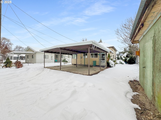 exterior space featuring a carport