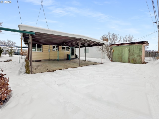 exterior space featuring an attached carport