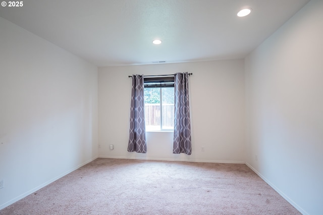 1067 S 55th St, Springfield, OR 97478 - carpeted empty room with recessed lighting and baseboards