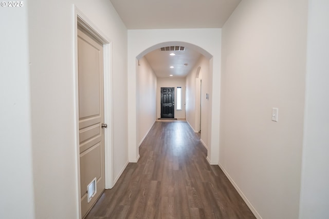 1067 S 55th St, Springfield, OR 97478 - hallway with arched walkways, dark wood-type flooring, and recessed lighting