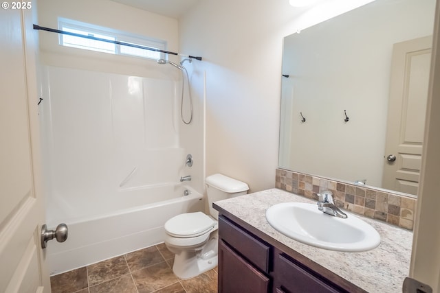 1067 S 55th St, Springfield, OR 97478 - bathroom featuring vanity, bathtub / shower combination, and backsplash
