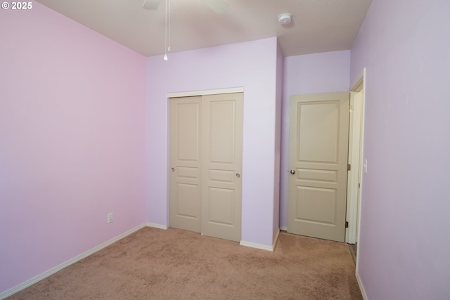 1067 S 55th St, Springfield, OR 97478 - unfurnished bedroom with light carpet, a closet, and a ceiling fan