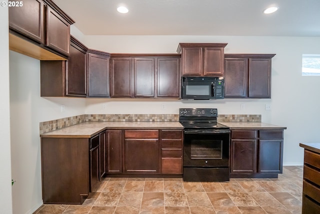 1067 S 55th St, Springfield, OR 97478 - kitchen featuring black appliances, light countertops, dark brown cabinets, and recessed lighting