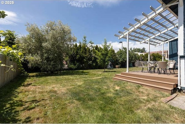 709 S Meridian St, Newberg, OR 97132 - view of yard featuring a deck, a pergola, and outdoor dining space