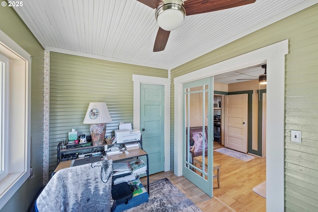 380 3rd Ave, Powers, OR 97466 - office space featuring ceiling fan, wood finished floors, and wooden walls