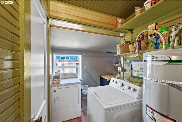 380 3rd Ave, Powers, OR 97466 - washroom with strapped water heater and independent washer and dryer