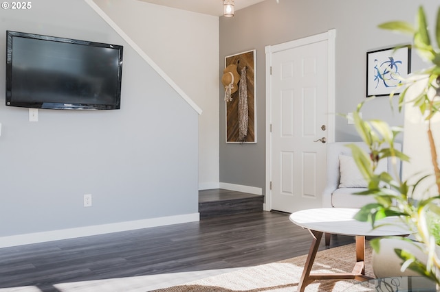 entrance foyer featuring dark hardwood / wood-style floors