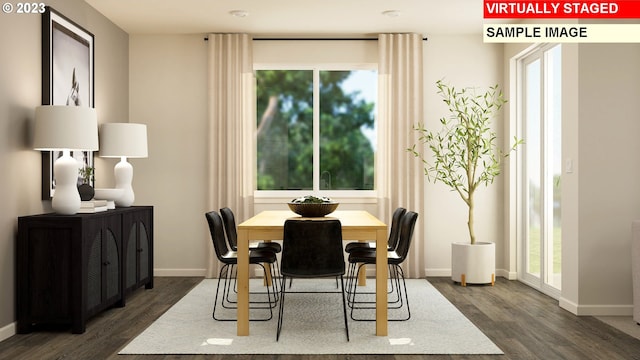 dining area with dark wood-type flooring