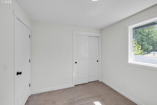 37465 Dubarko Rd, Sandy, OR 97055 - unfurnished bedroom with carpet floors and a closet