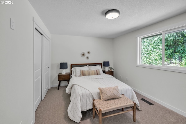 37465 Dubarko Rd, Sandy, OR 97055 - carpeted bedroom with a textured ceiling and a closet