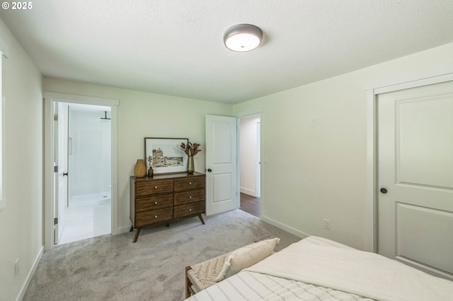 37465 Dubarko Rd, Sandy, OR 97055 - bedroom featuring carpet floors, ensuite bath, a closet, and a textured ceiling