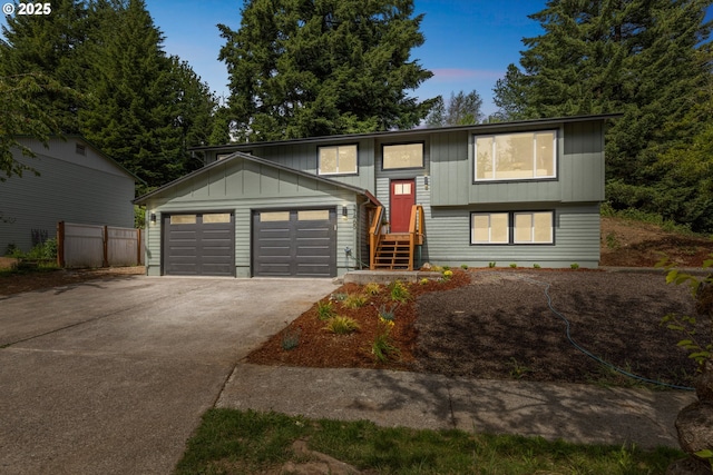 37465 Dubarko Rd, Sandy, OR 97055 - split foyer home with driveway, a garage, and board and batten siding