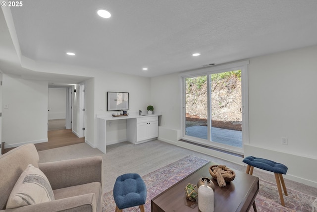 37465 Dubarko Rd, Sandy, OR 97055 - living area with light colored carpet, recessed lighting, and built in study area