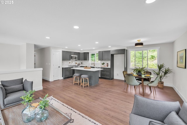 37465 Dubarko Rd, Sandy, OR 97055 - living area with healthy amount of natural light, recessed lighting, and wood finished floors