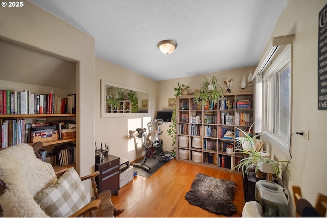 4664 N Mckay Rd, Prineville, OR 97754 - living area with wood finished floors and a textured ceiling