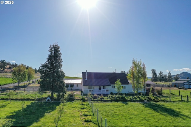 4664 N Mckay Rd, Prineville, OR 97754 - rear view of house with a rural view and metal roof