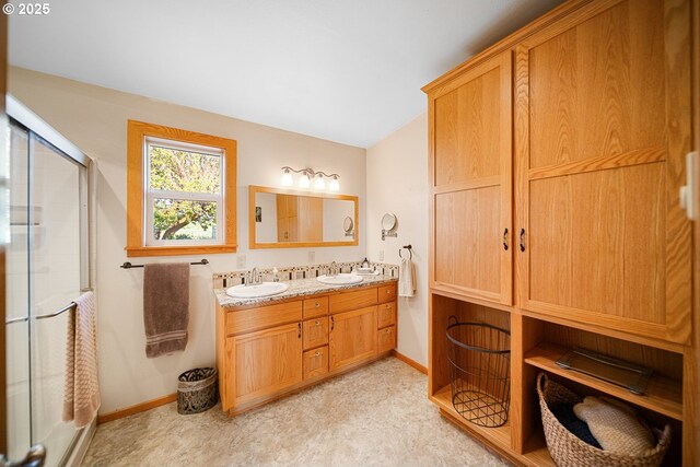 4664 N Mckay Rd, Prineville, OR 97754 - full bathroom with a shower stall, baseboards, double vanity, and tile patterned floors