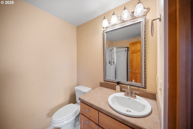 4664 N Mckay Rd, Prineville, OR 97754 - full bathroom featuring toilet, vanity, and a shower with shower door