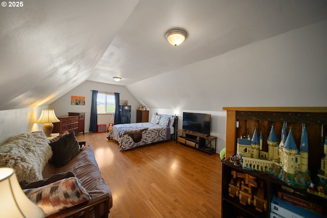 4664 N Mckay Rd, Prineville, OR 97754 - bedroom with lofted ceiling and wood finished floors