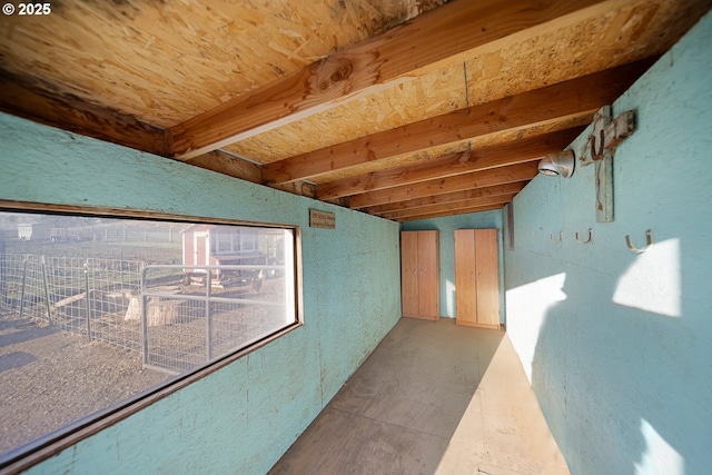 4664 N Mckay Rd, Prineville, OR 97754 - hall with a textured wall and concrete floors