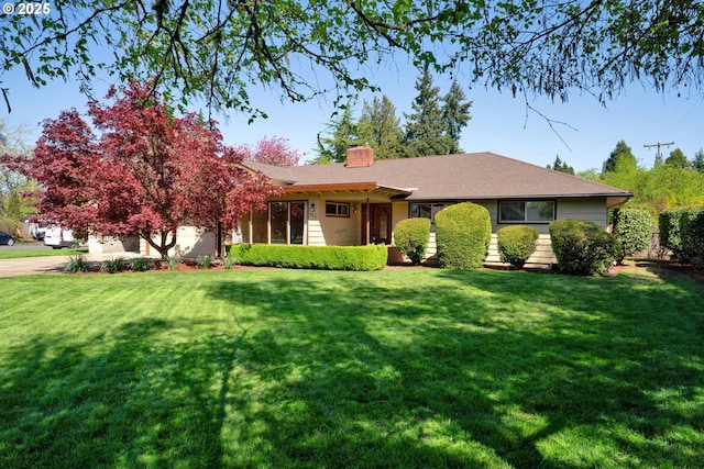 925 Ascot Dr, Eugene, OR 97401 - single story home featuring an attached garage, driveway, a chimney, and a front yard