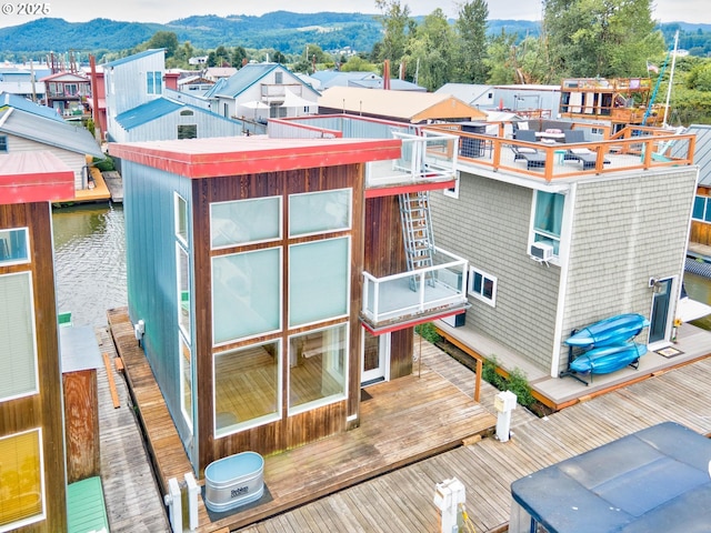 birds eye view of property featuring a mountain view